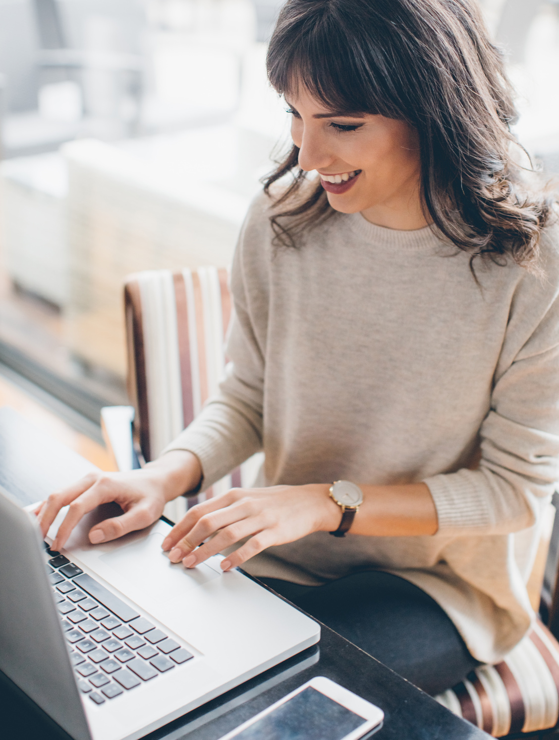 Young woman typing